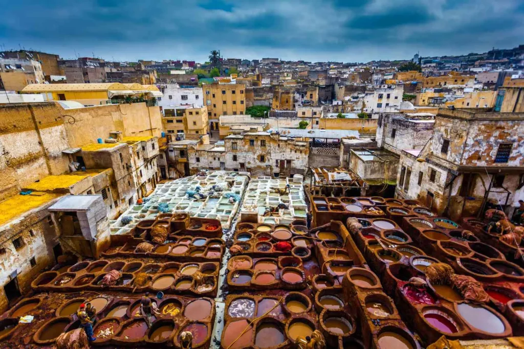 The ancient Medina of Fez, Morocco, featuring narrow alleyways, bustling souks, and stunning traditional architecture.