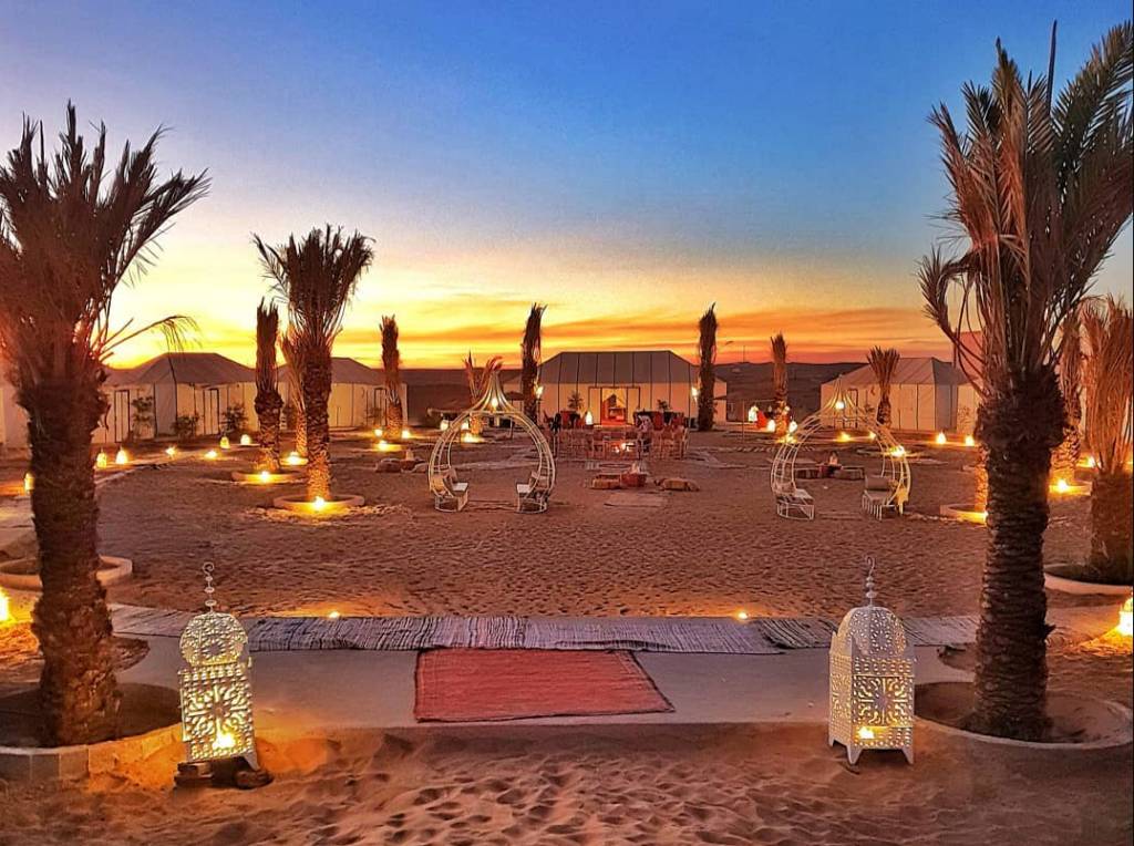 Stargazing in the Sahara Desert as part of your Marrakech Desert Tour, capturing the clear night sky and constellations for a memorable adventure.